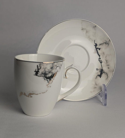 6 tasses à café marbré de la marque HomeDeLuxe, en céramique, avec motif marbré blanc et beige.