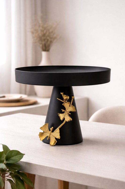 Présentoir à gâteau noir élégant orné de détails papillon délicats dorés - Home de Luxe France