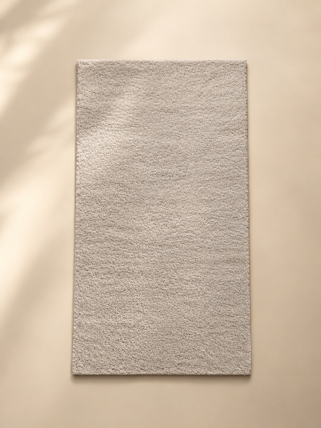 Petit tapis gris