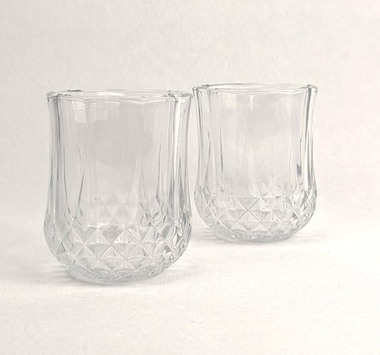 Verres à eau en verre transparent de la marque HomeDeLuxe, lot de 12 verres élégants pour boissons.