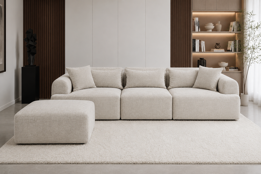 Canapé modulable Mila Marbella crème de la marque HomeDeLuxe, avec coussins confortables et design moderne pour salon élégant.