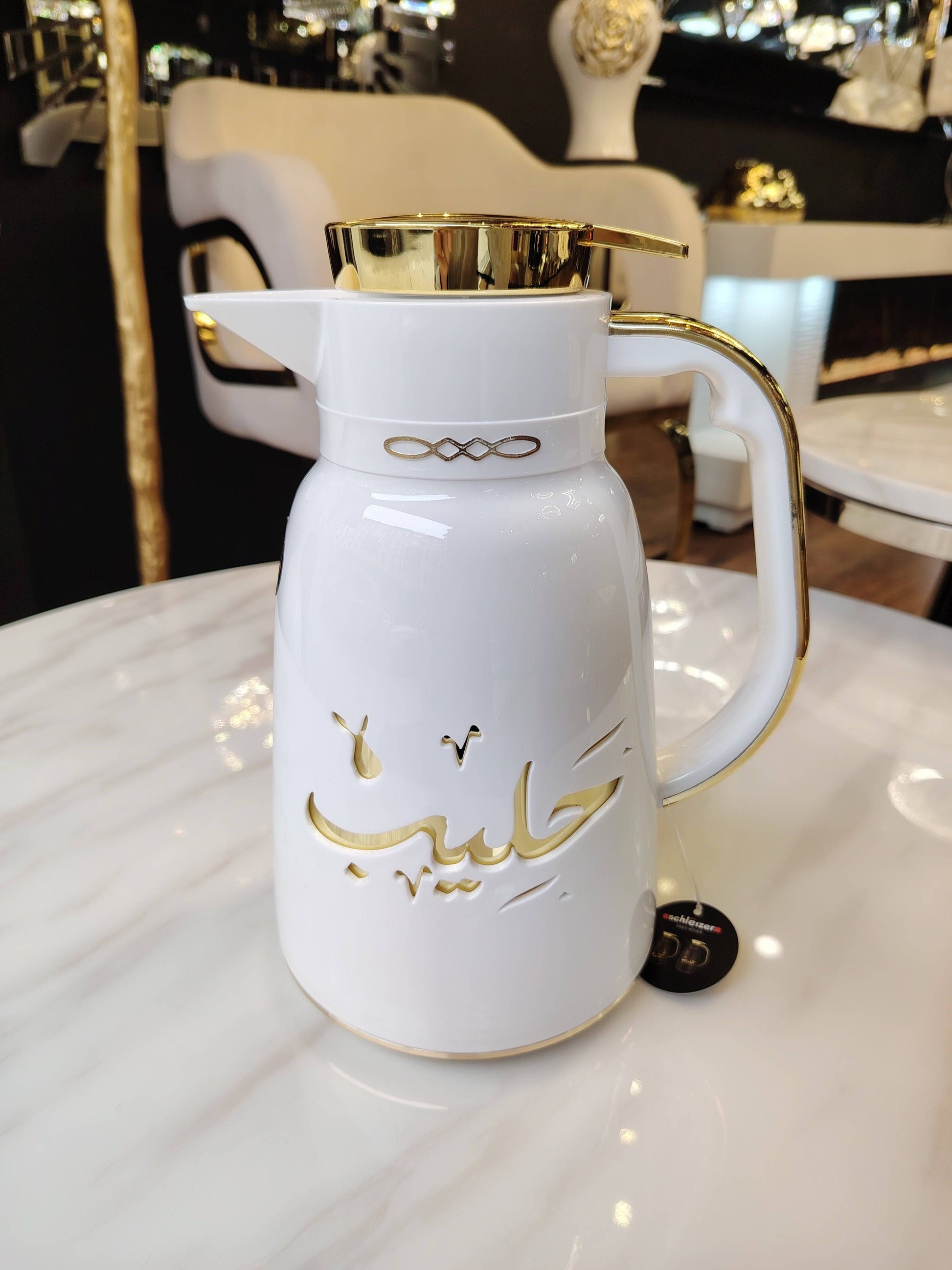 Thermos HomeDeLuxe pour lait et café, isolant thermique avec bouchon refermable, en acier inoxydable élégamment conçu.