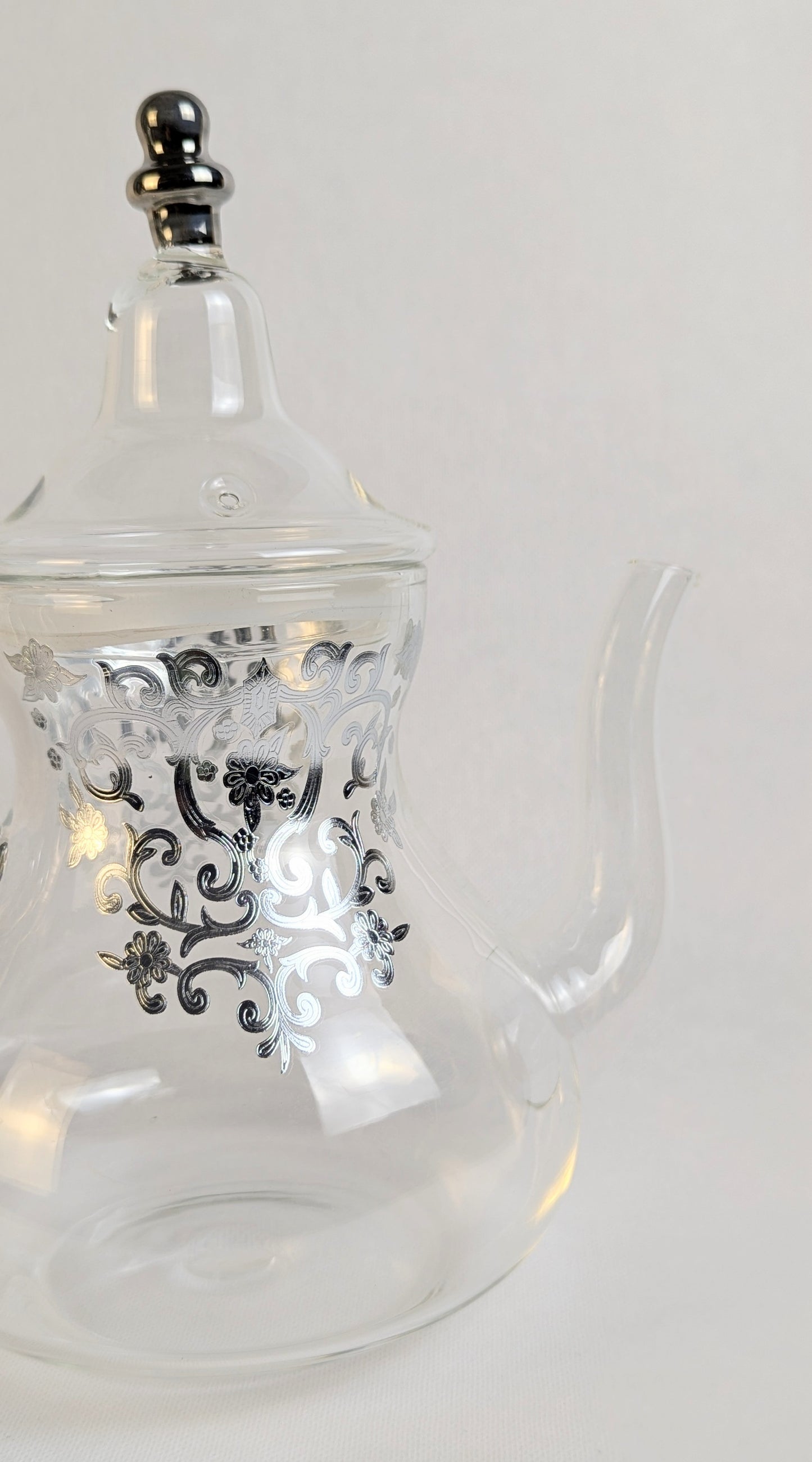 Théière en verre argentée