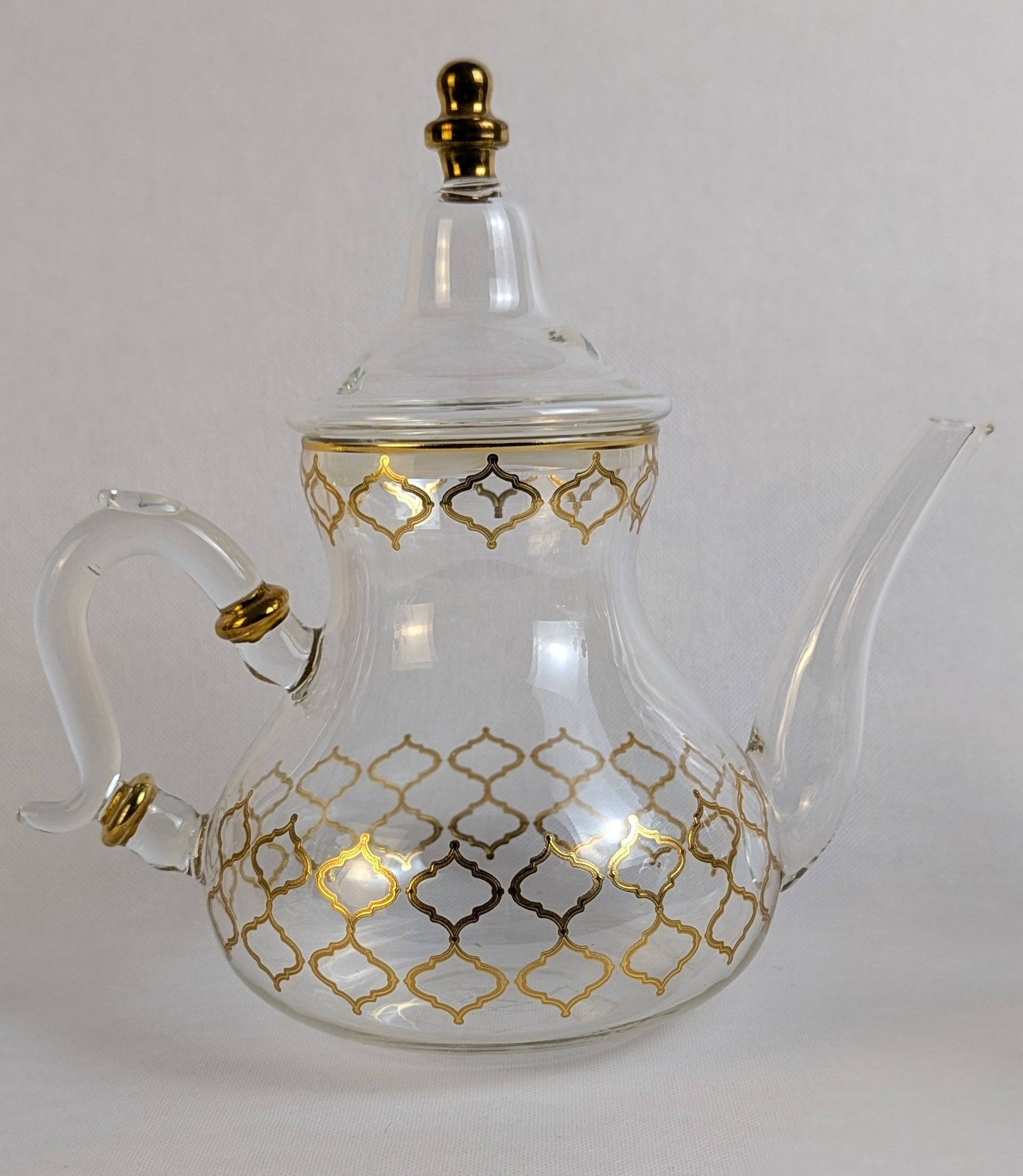 Théière en verre Fès de marque HomeDeLuxe, transparente, avec poignée en verre et design élégant pour infuser le thé.