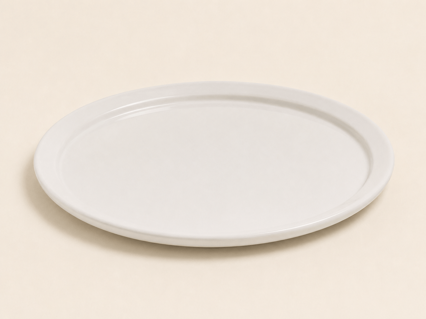 Plat pour présentation HomeDeLuxe en céramique, rond et blanc, idéal pour servir ou décorer la table.