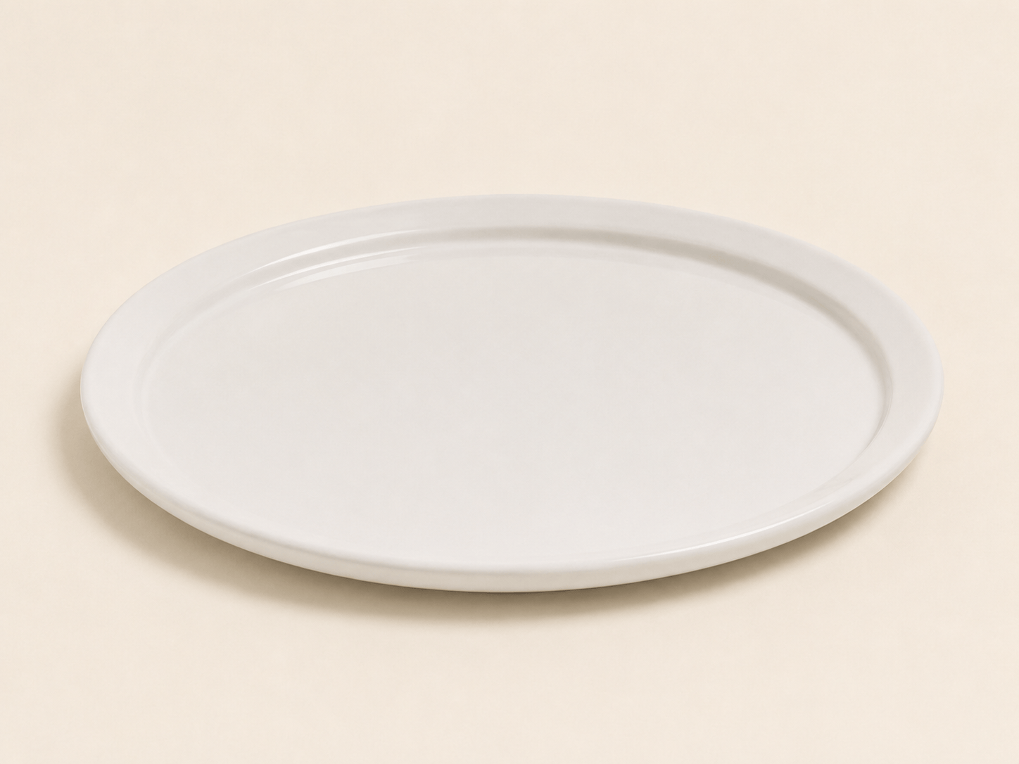 Plat pour présentation HomeDeLuxe en céramique, rond et blanc, idéal pour servir ou décorer la table.