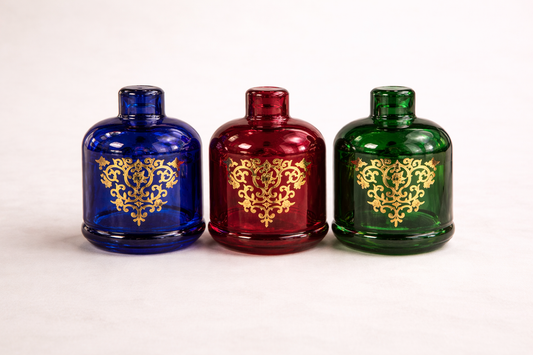 Bonbonnière colorée de style marocain de la marque HomeDeLuxe, décorative avec motifs colorés pour rangement ou décoration.