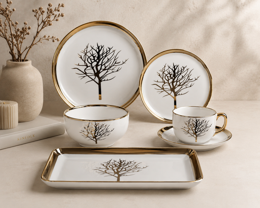 Service de table de 32 pièces en arbre doré de HomeDeLuxe, assiettes et couverts élégants pour repas sophistiqués.