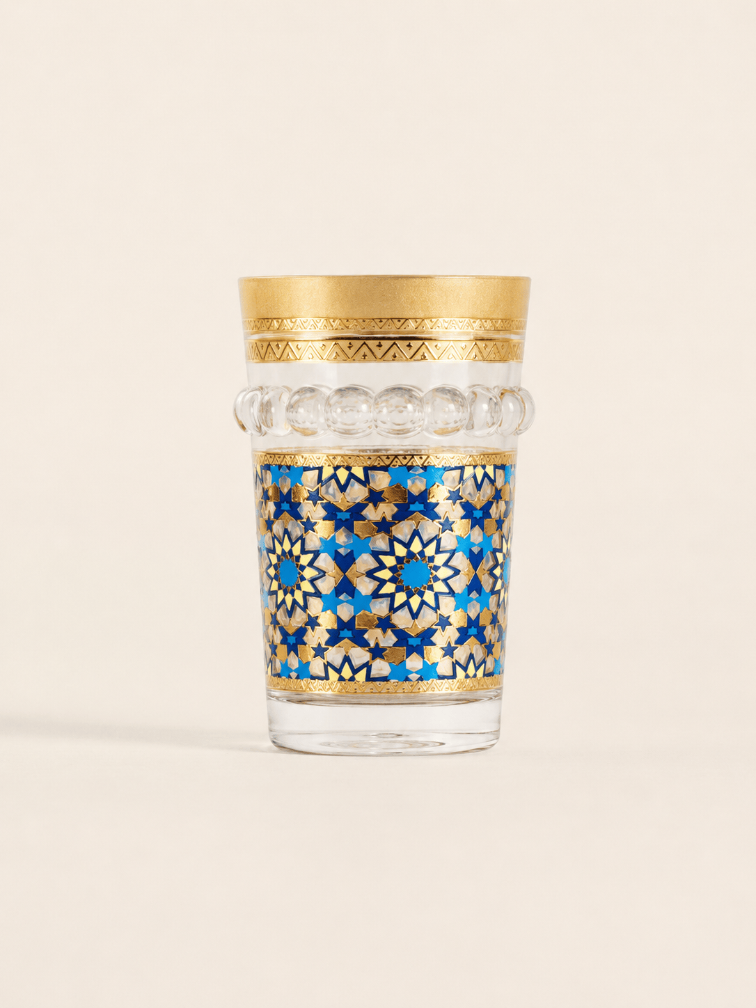 Douze verres à thé Marrakech Prestige en verre transparent, conçus par HomeDeLuxe pour une dégustation élégante.