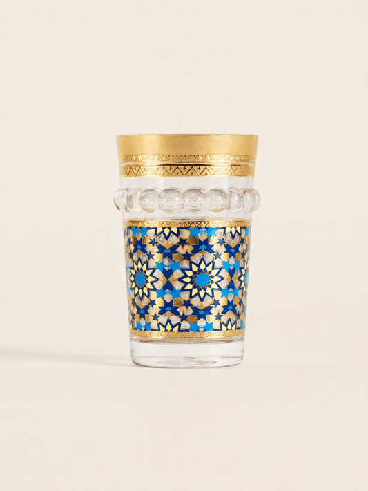 Douze verres à thé Marrakech Prestige en verre transparent, conçus par HomeDeLuxe pour une dégustation élégante.