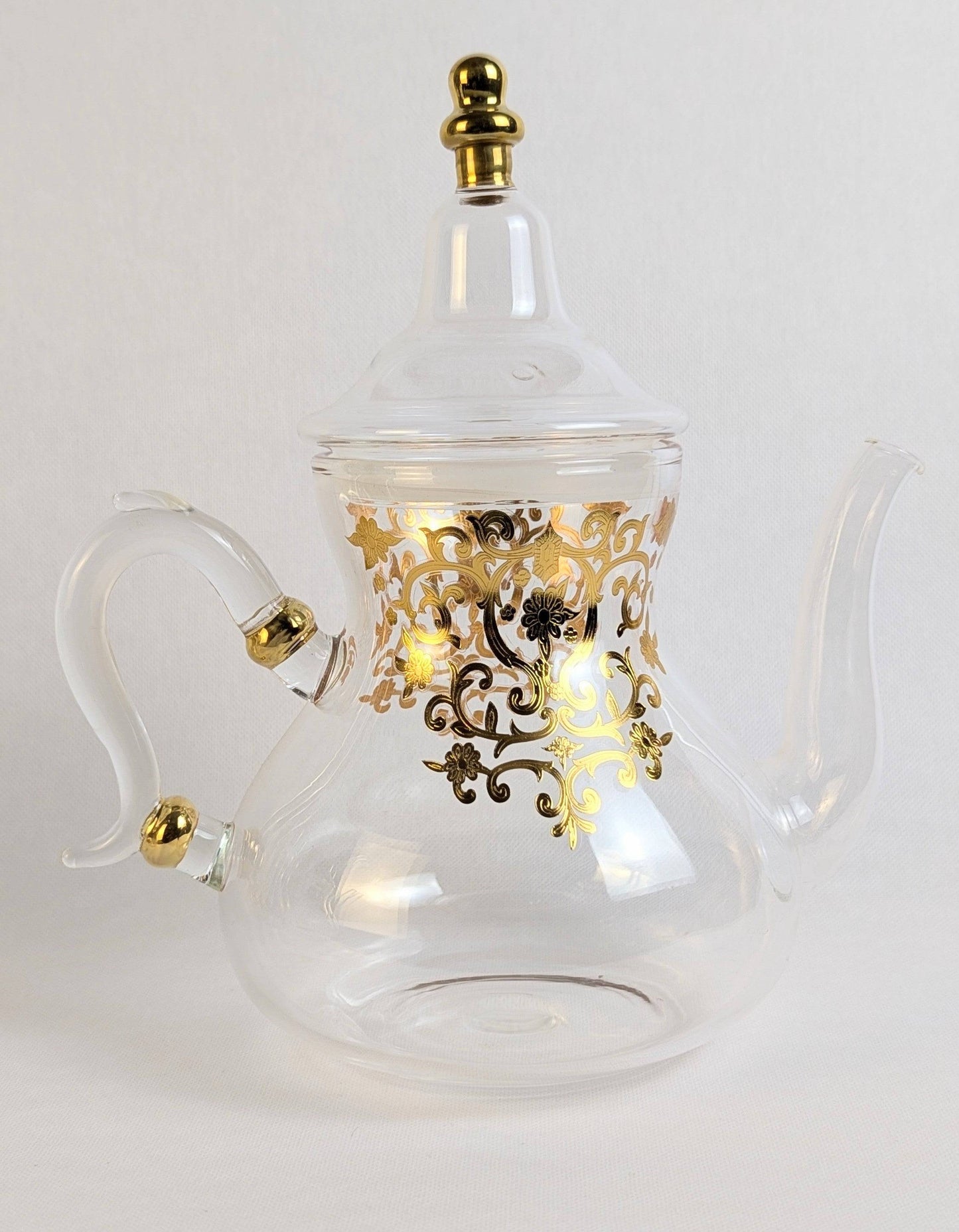 Théière en verre HomeDeLuxe Rabat dorée avec couvercle, design élégant et transparent, idéale pour infuser le thé.