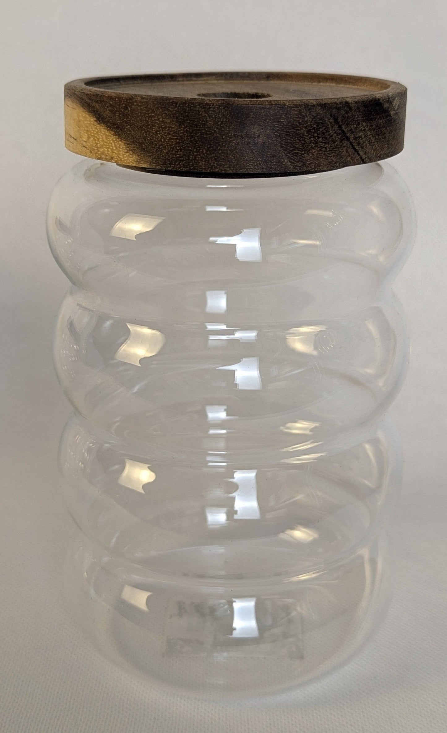 Grand bocal en verre HomeDeLuxe avec couvercle en verre, parfait pour conserver aliments et produits secs.