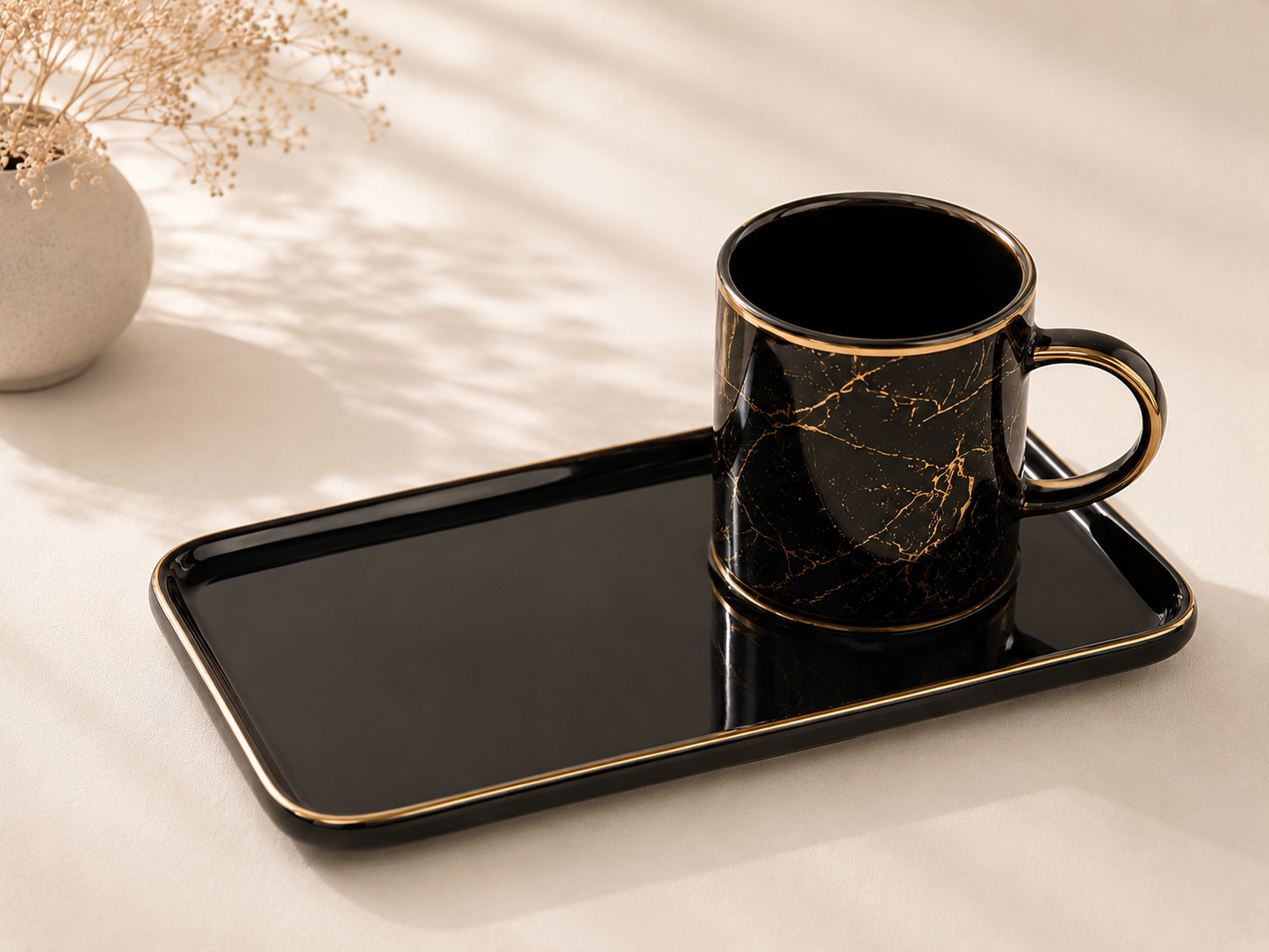 Duo de tasses et sous tasses noires