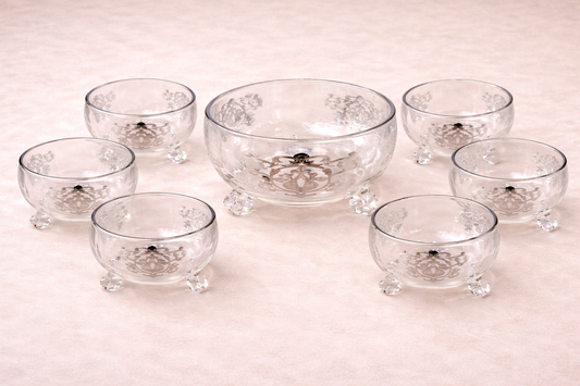 Présentoir rabat HomeDeLuxe en plastique avec compartiments pour présentation organisée de produits.